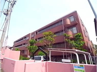 サニーハウス岡本の外観|タイル張りで重厚感があります。