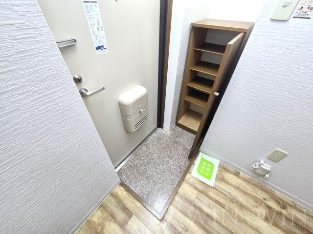 サンライズ羽根井本町の玄関