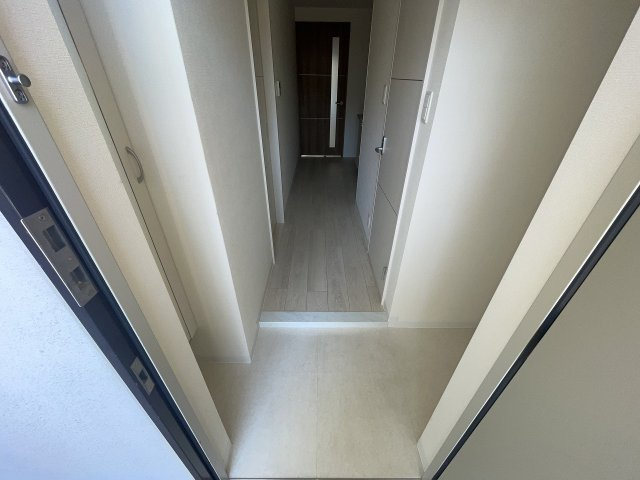 レユシール塚本の玄関