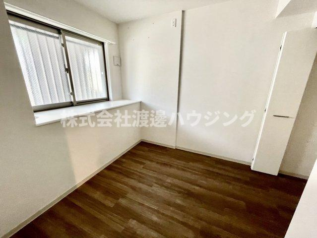 ペンギンズマンション箕面新稲の寝室