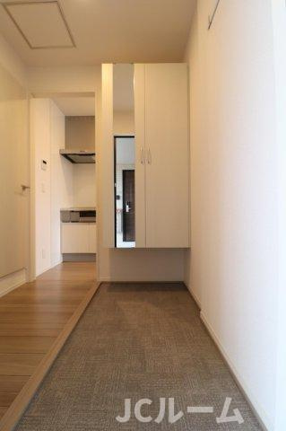 サンリジェール春日新田の玄関