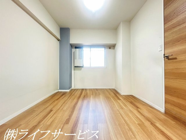 【洋室】 | ファミールハイツ北大阪１号棟 | 玄関側洋室5.2帖（一部AIによる家具消し加工済）