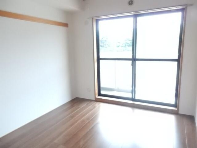 川崎市多摩区栗谷４丁目の賃貸マンションの寝室