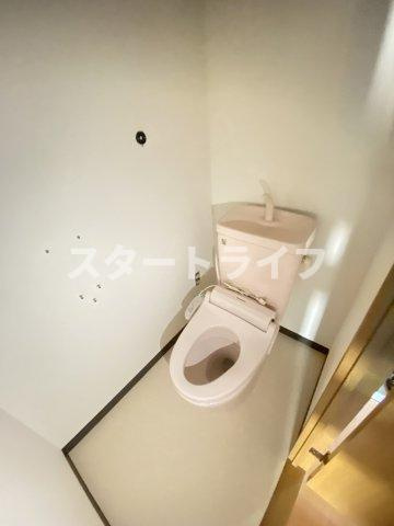 大阪市淀川区十三東１丁目の賃貸マンションのトイレ