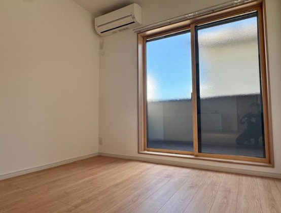 トラスティ野田通の洋室