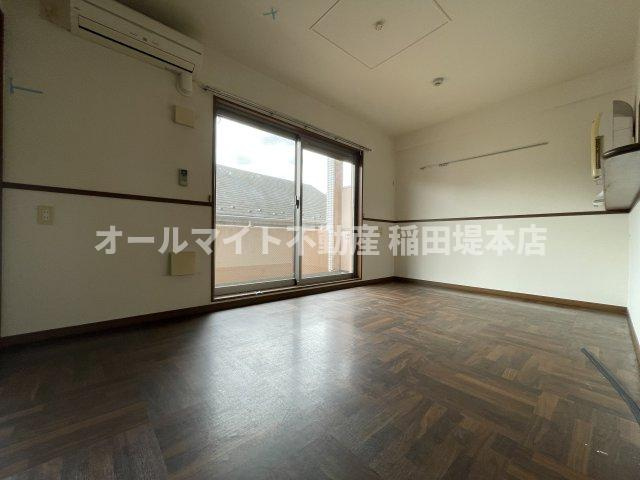 狛江市中和泉２丁目の賃貸マンションの居間・リビング