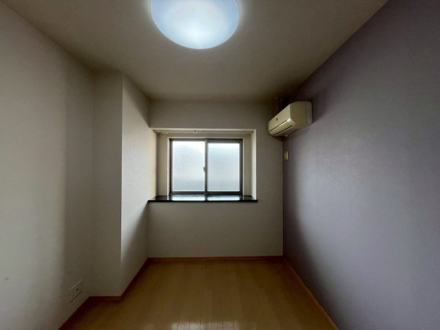 プレミスト北谷プロムナードクルーズ（中古マンション）の洋室