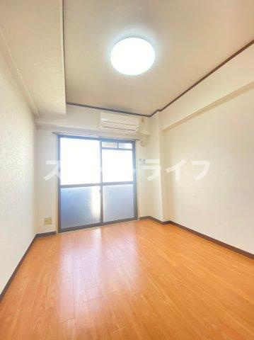 大阪市東淀川区東中島５丁目の賃貸マンションの寝室
