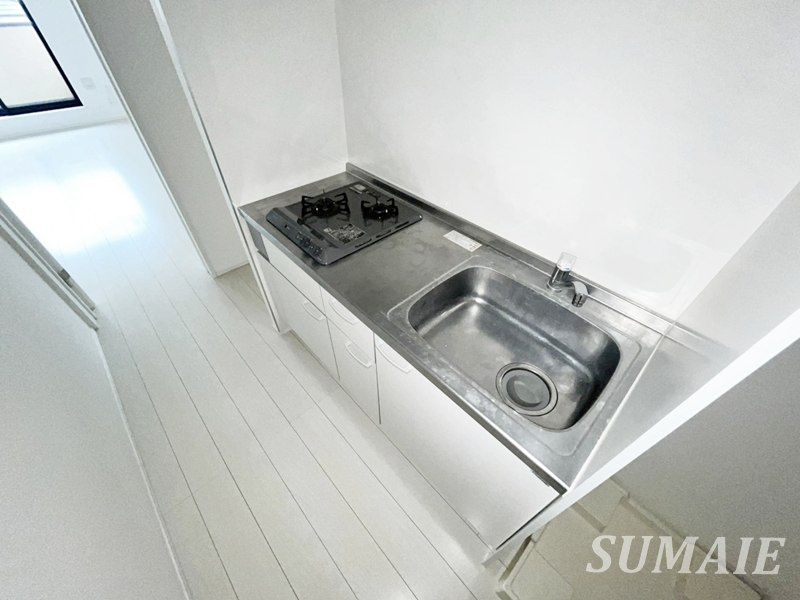 gloire　Ⅱの設備|キッチン横洗濯機置場