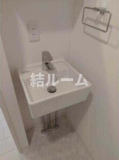 中野区沼袋１丁目の賃貸マンションの洗面所