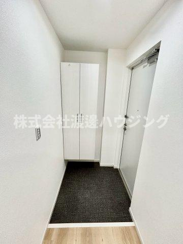 アルカンシェルコート豊津の玄関