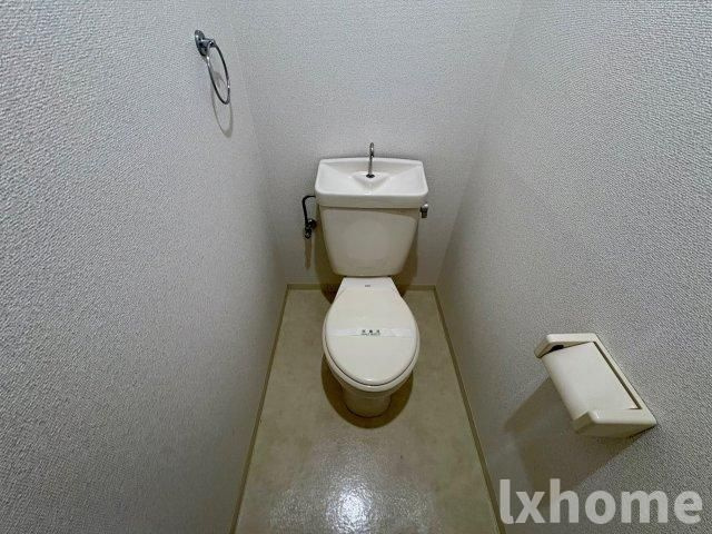 メイプルヴィラ茨木Ⅱのトイレ|落ち着いた色調のトイレです