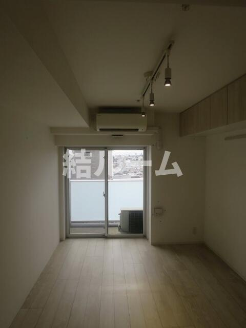 北区堀船１丁目の賃貸マンションの居間・リビング