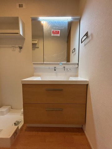 府中市栄町２丁目のアパートの洗面所