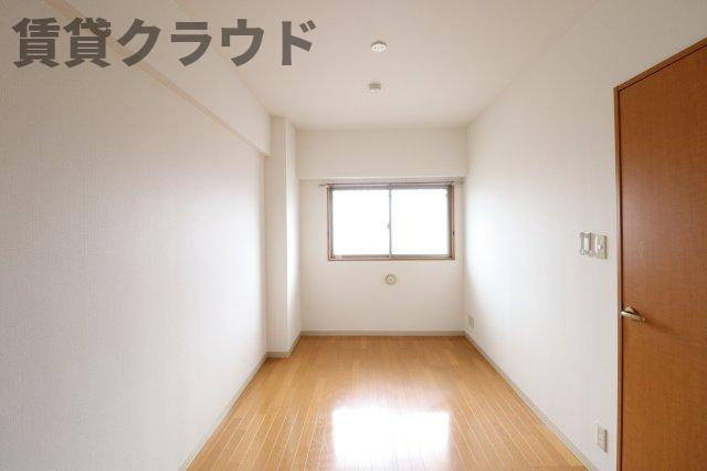 プラザヤマトニの寝室|落ち着いた色調の寝室です
