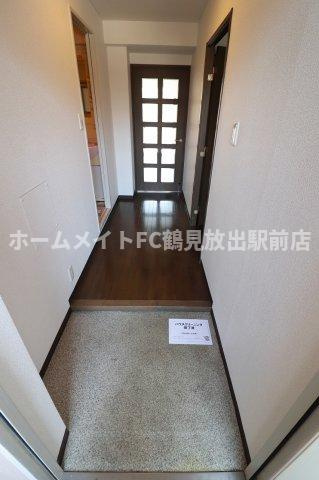 大阪市鶴見区今津中１丁目の賃貸マンションの玄関