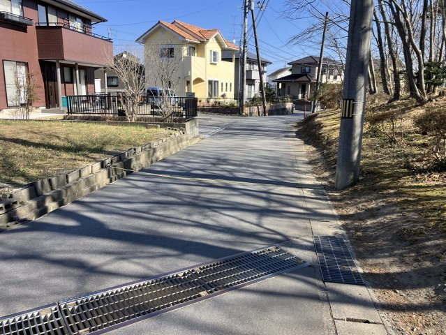 金山町朝日台売土地の前面道路含む現地写真