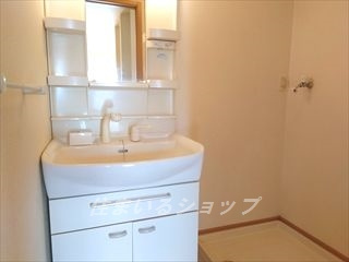 安芸高田市八千代町上根のアパートの洗面所