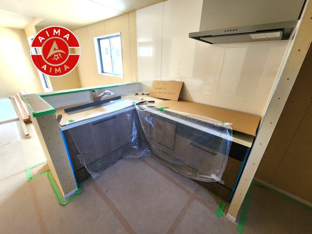 福岡市城南区鳥飼6丁目第1-2棟（1号棟）　の内観：施工例|ダイニングテーブルへの配膳がラクラク、お料理はかどるカウンター付きシステムキッチン！