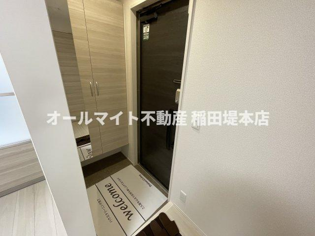川崎市多摩区中野島５丁目のアパートの玄関