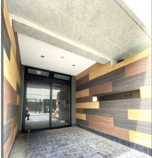 北区田端新町３丁目の賃貸マンションのエントランス