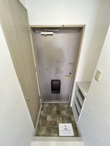 大阪市都島区都島北通１丁目の賃貸マンションの玄関