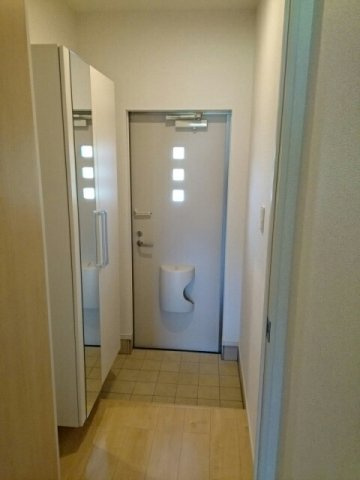 プレジール　Ｍの玄関