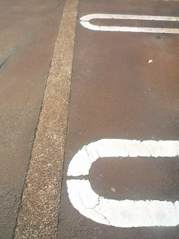 グランシャレー春日の駐車場