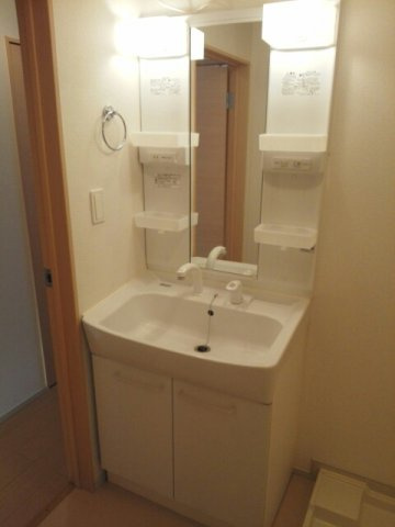 グランシャレー春日の洗面所