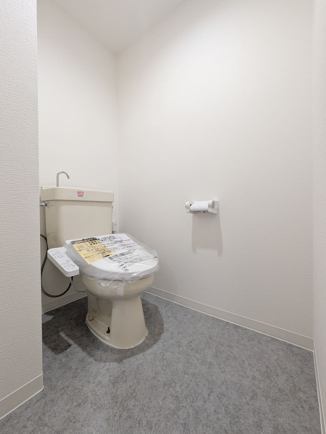 ウイングパレスのトイレ|落ち着いた色調のトイレです