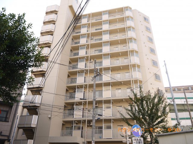 【外観】 | コープ野村王子東 | モダンでスタイリッシュな印象を与えるベージュを基調とした外観。