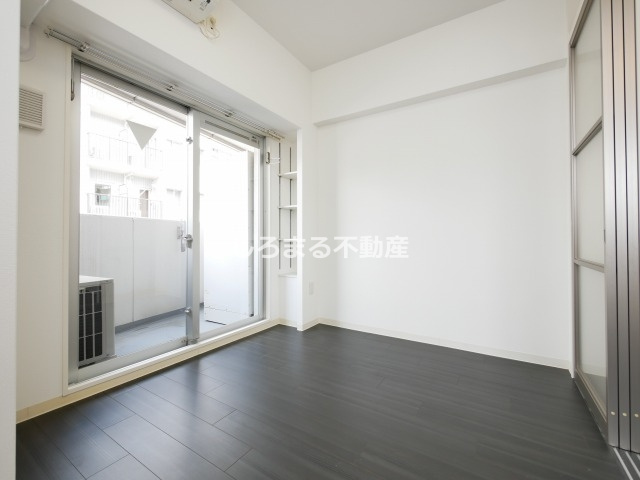 プライムアーバン松屋町の洋室