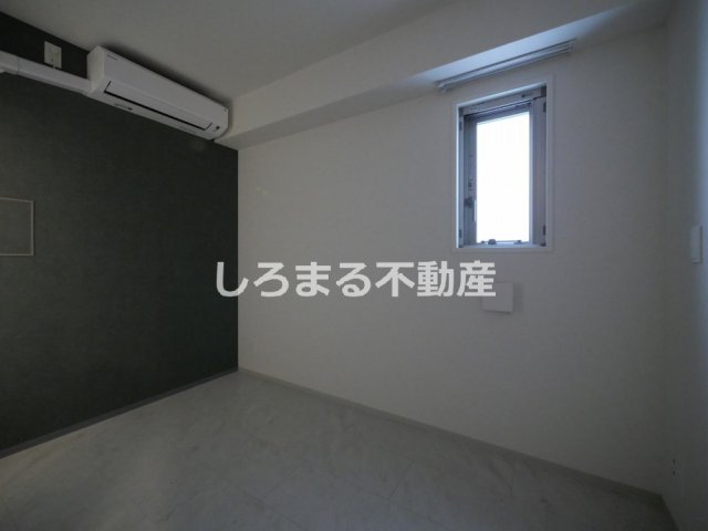 アーバネックス堺筋本町の洋室