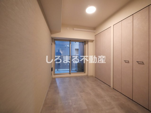 アーバネックス堺筋本町の洋室