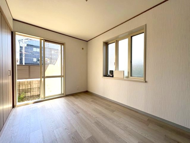 新栄プロパティーはびきのⅡの寝室
