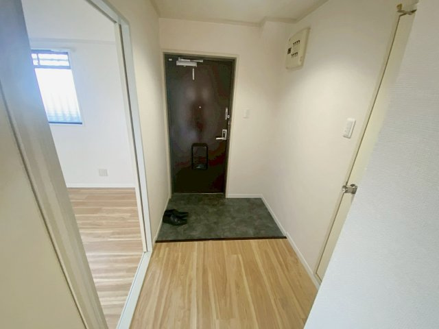 マンションむなかたの玄関