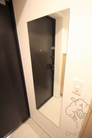 レジュールアッシュ三国本町の玄関