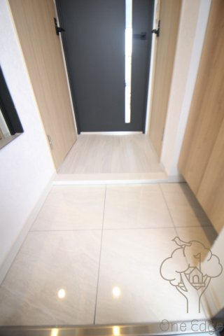 レジュールアッシュ三国本町の玄関
