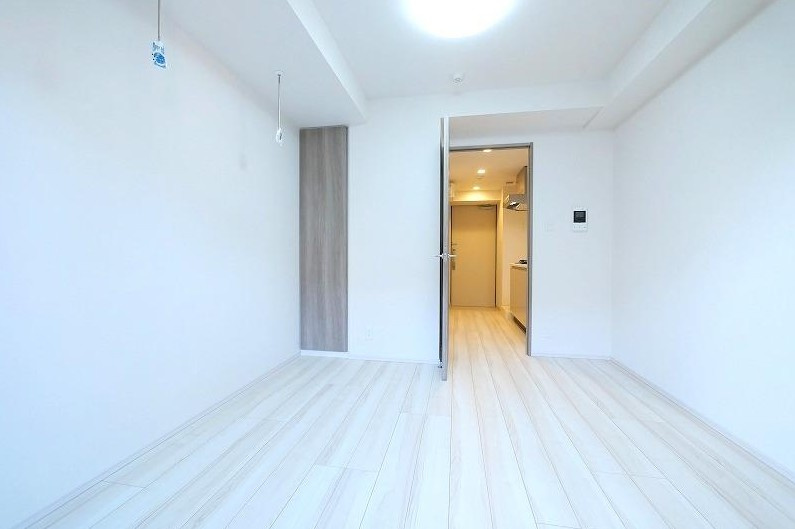 稲城市東長沼の賃貸マンションの居間・リビング