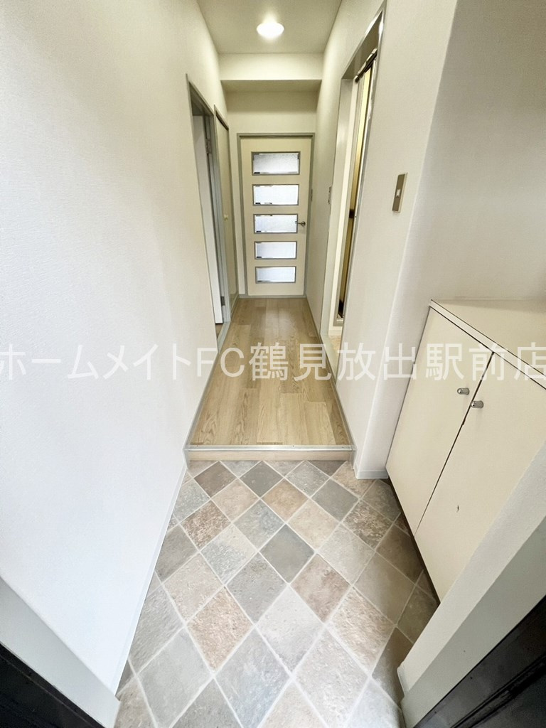 大阪市鶴見区横堤３丁目の賃貸マンションの玄関