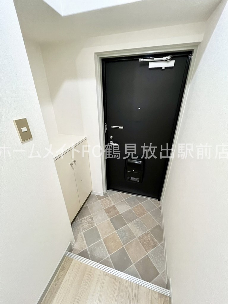 大阪市鶴見区横堤３丁目の賃貸マンションの玄関