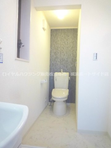 清潔感のある落ち着いたトイレ空間