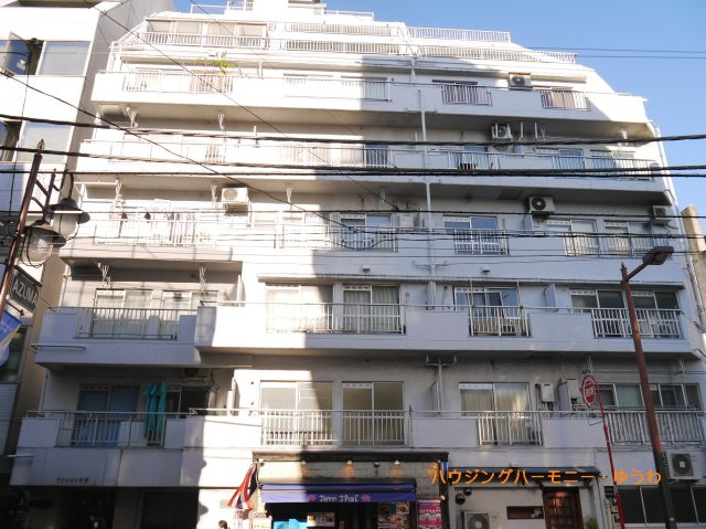 【外観】 | マンション池袋 | モダンでスタイリッシュな印象を与えるグレーを基調とした外観。