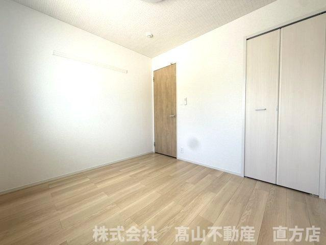 直方市大字直方のアパートの寝室