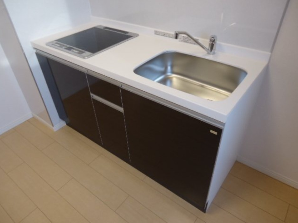 稲城市百村のアパートのキッチン