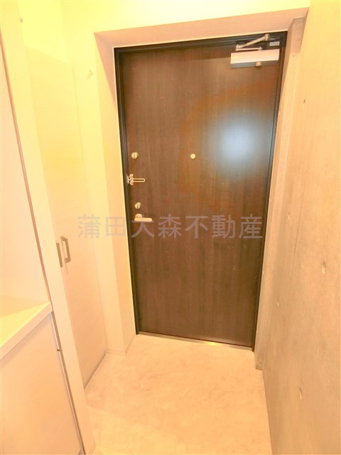 GRAN PASEOグランパセオ蒲田Ⅱの玄関