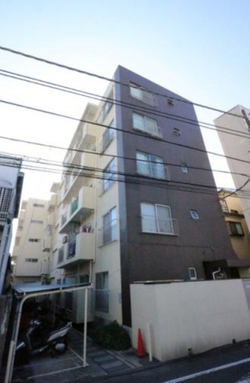 【外観】 | 池袋SYマンション | 陽光浴びる外観がシンプルな外観をより際立たせ、人々の記憶に存在感を植え付けます。