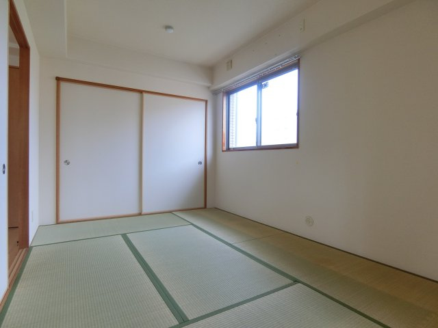 ファミーユ千里丘の寝室