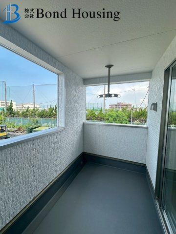 「オール電化」「並列2台可能」西二見第23　4号棟のバルコニー