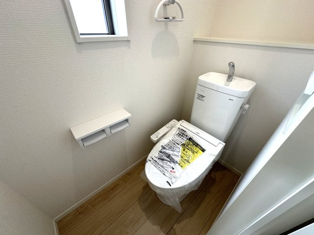 明石市大久保町谷八木新築戸建６号棟のトイレ